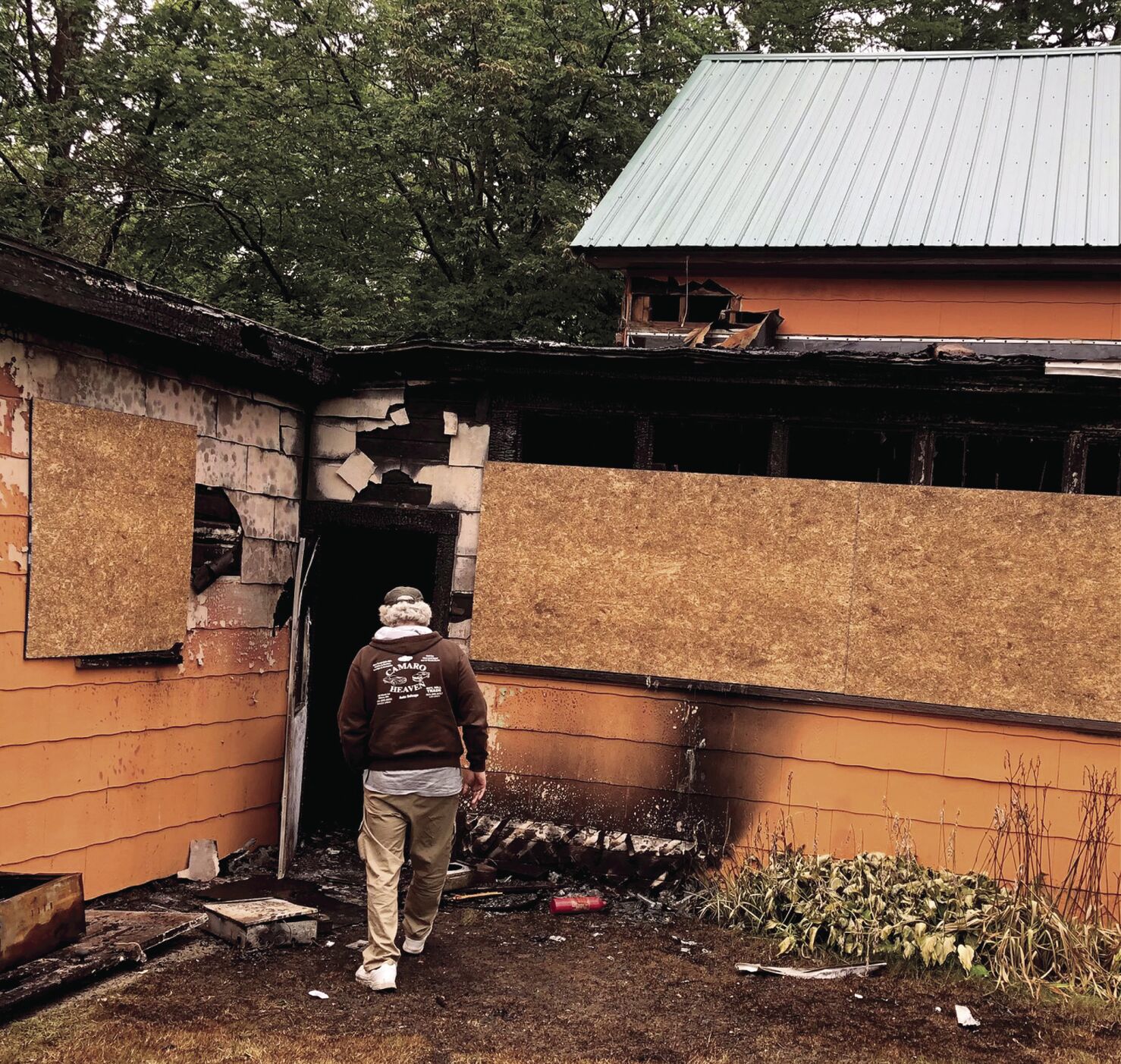 Fire destroys business; damages home